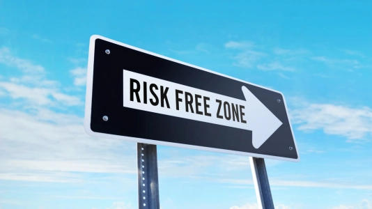 An image of a sign labeled "Risk Free Zone"