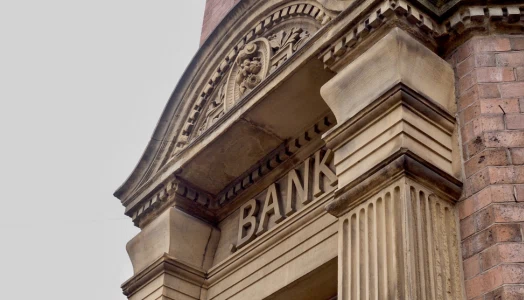 An image of a building with BANK symbol in it