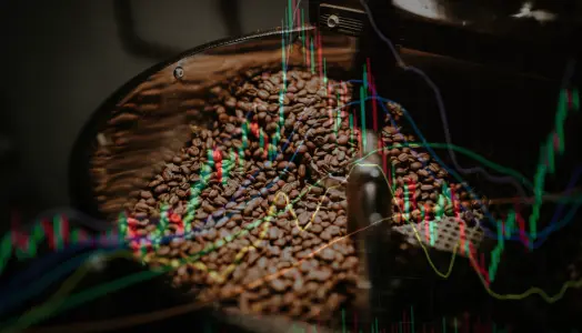 An image of coffee beans overlayed on an online trading chart